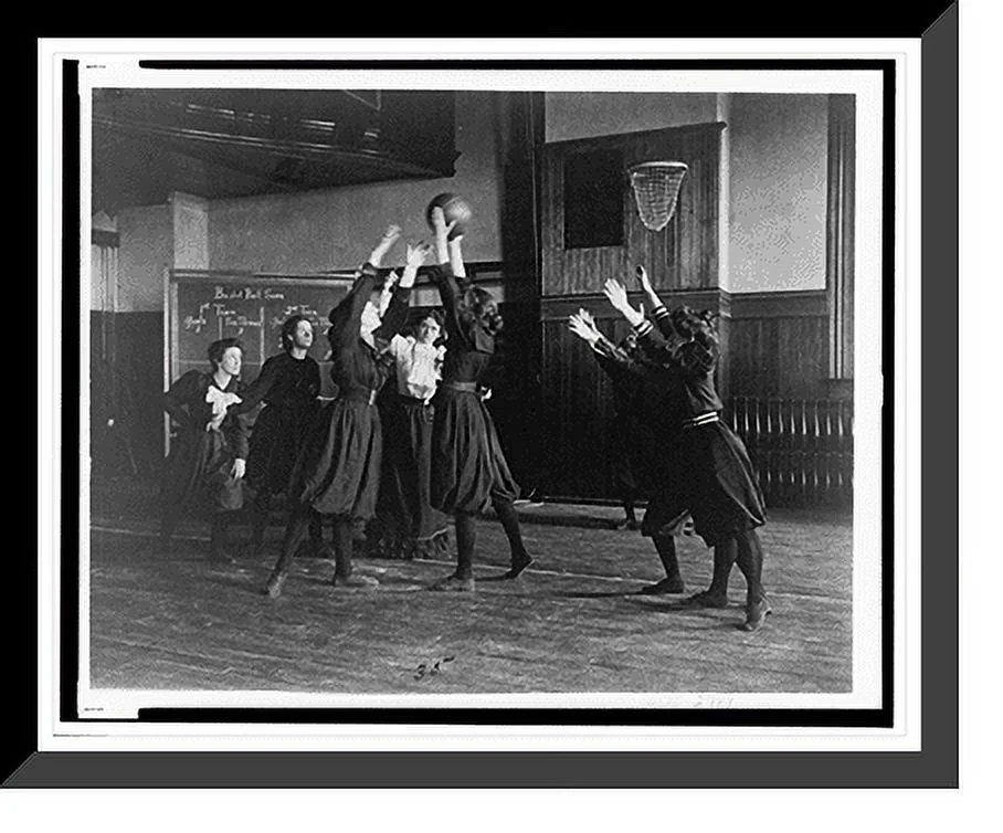 Historic Framed Print, [Female students playing basketball in a gymnasium, Western High School, Washington, D.C.], 17-7/8