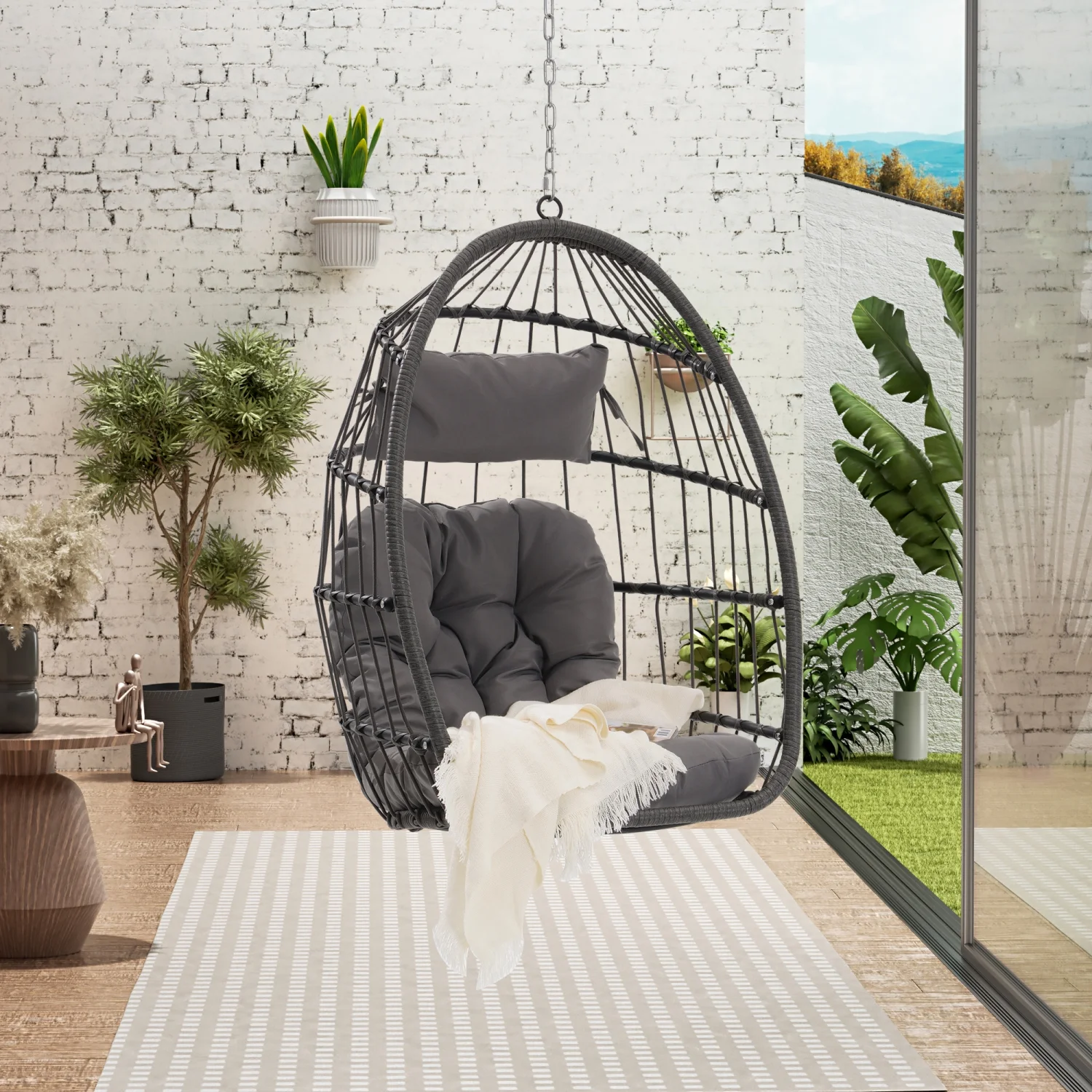 arden. Add a touch of Luxury to your outdoor decor with this Comfortable and Stylish Rattan Hanging Egg Swing Chair. Experience the Ultimate Relaxation and Comfort in your Outdoor Space w