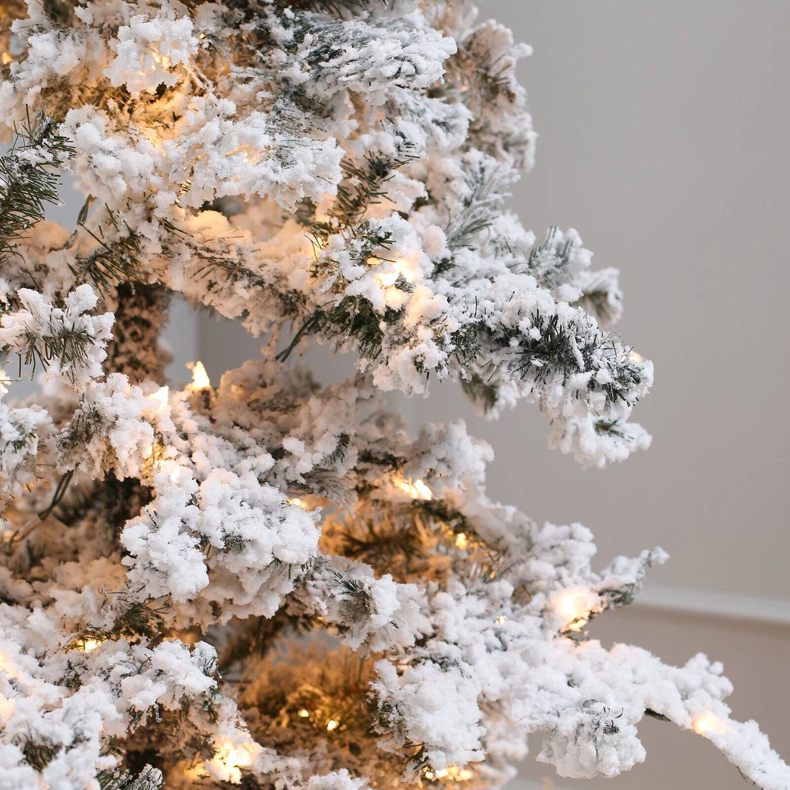 7.5 ft. Pre Lit Clear Lights Heavy Flocked Layered Spruce