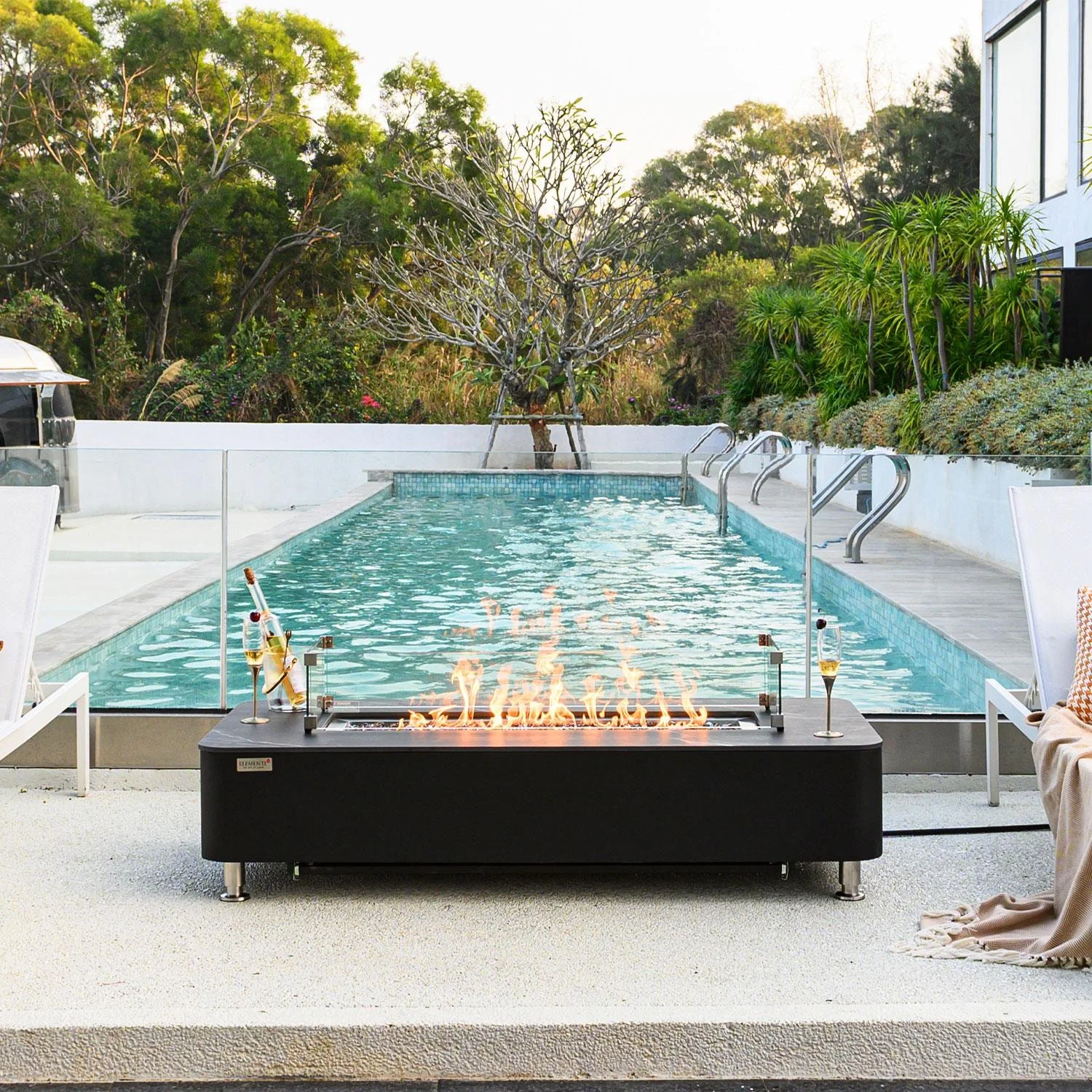 Crossview 62 Inch Rectangular Concrete Propane Fire Pit Table in Black By Lakeview Outdoor Designs