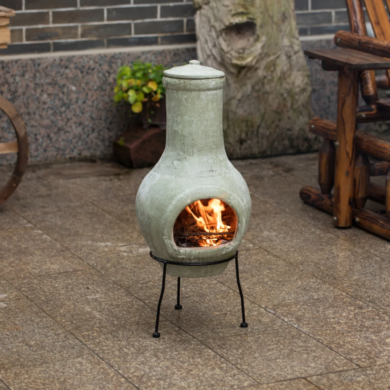 Indoor and Outdoor Beige Clay Chimenea Scribbled Design Fire Pit with Metal Stand