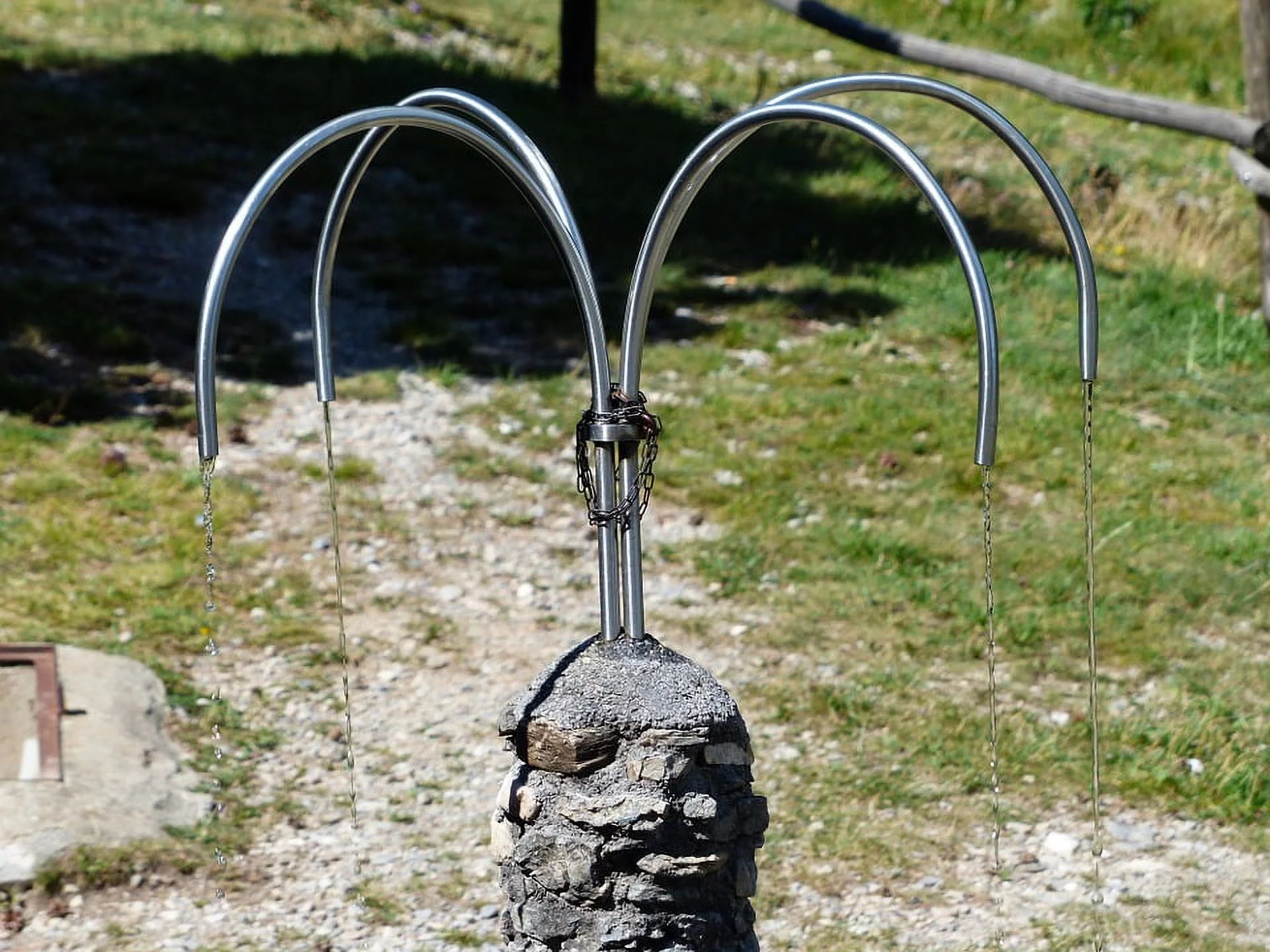 Water Water Dispenser Metal Fountain Stone Fountain - Laminated Poster Print - 20 Inch by 30 Inch with Bright Colors and Vivid Imagery