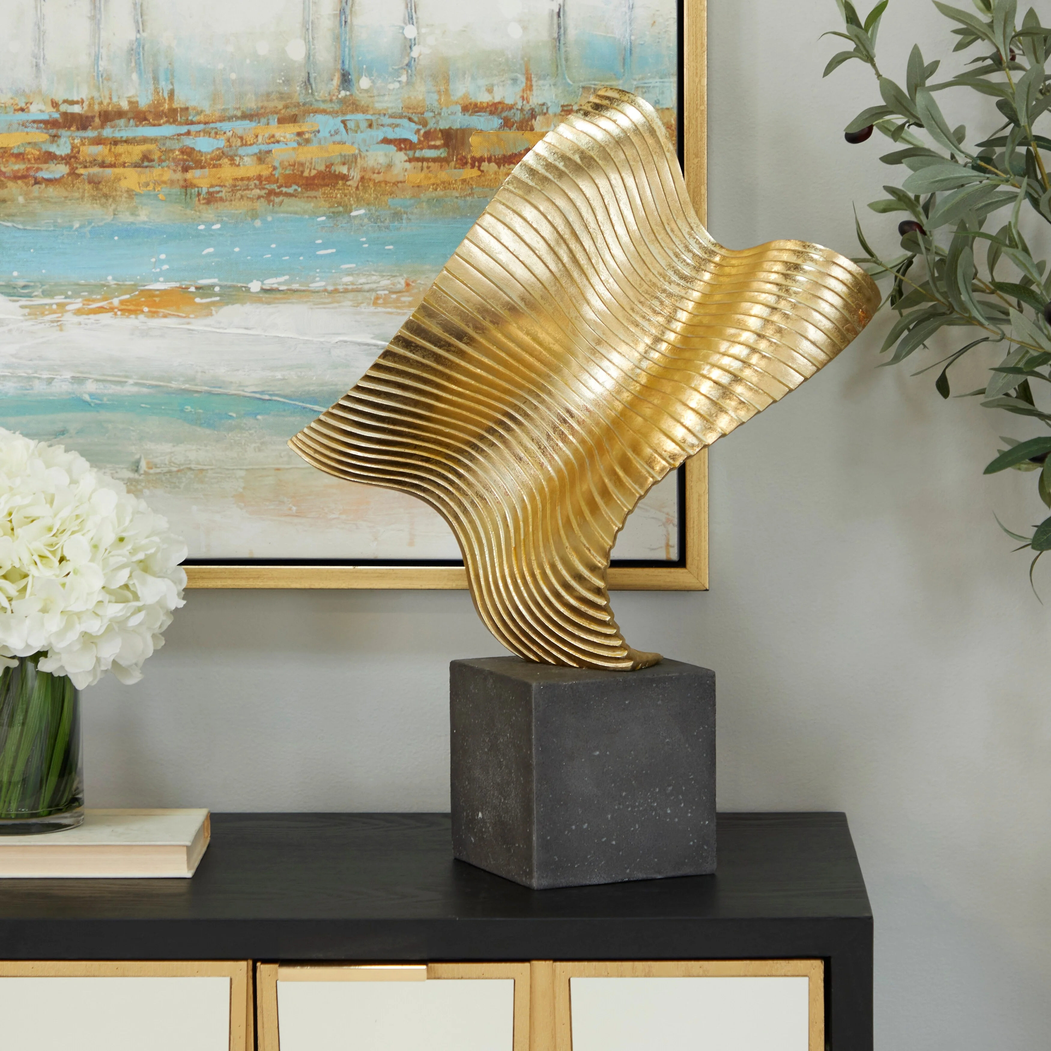 The Novogratz  Gold Polystone Wave Abstract Sculpture with Black Base