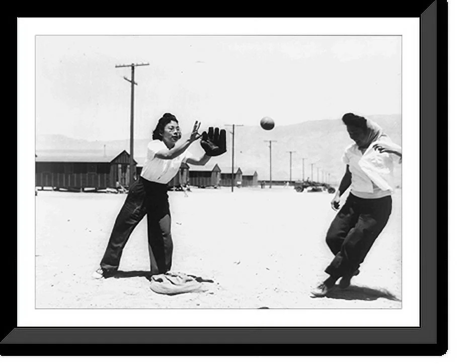 Historic Framed Print, [Girls of Japanese ancestry playing softball at war relocation authority center, Manzanar, California: Misao Skugimoto and Rose Maruki at third base], 17-7/8 x 21-7/8