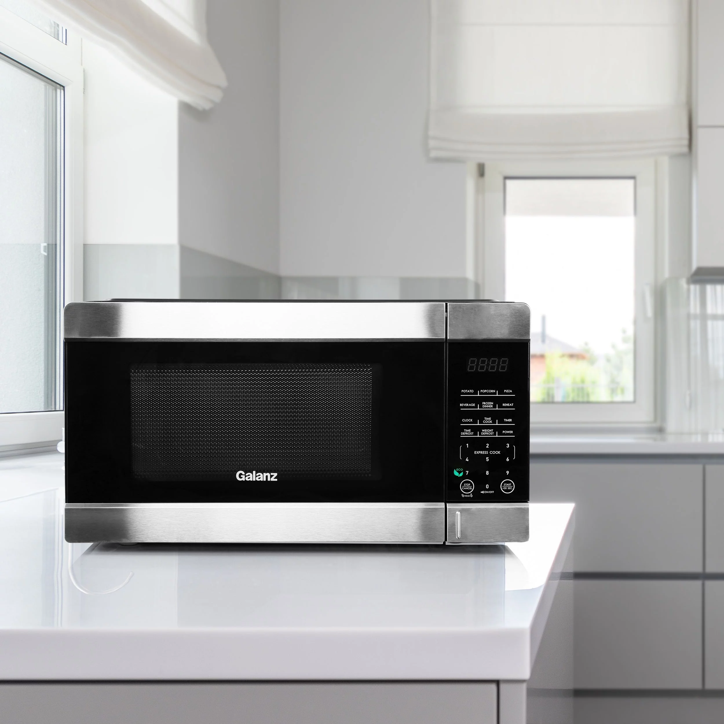Galanz 1.1 cu ft 1000W Countertop Microwave Oven in Black with One Touch Express Cooking