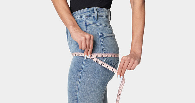 Measure around the fullest part of your hips, about 8” down from your waist.